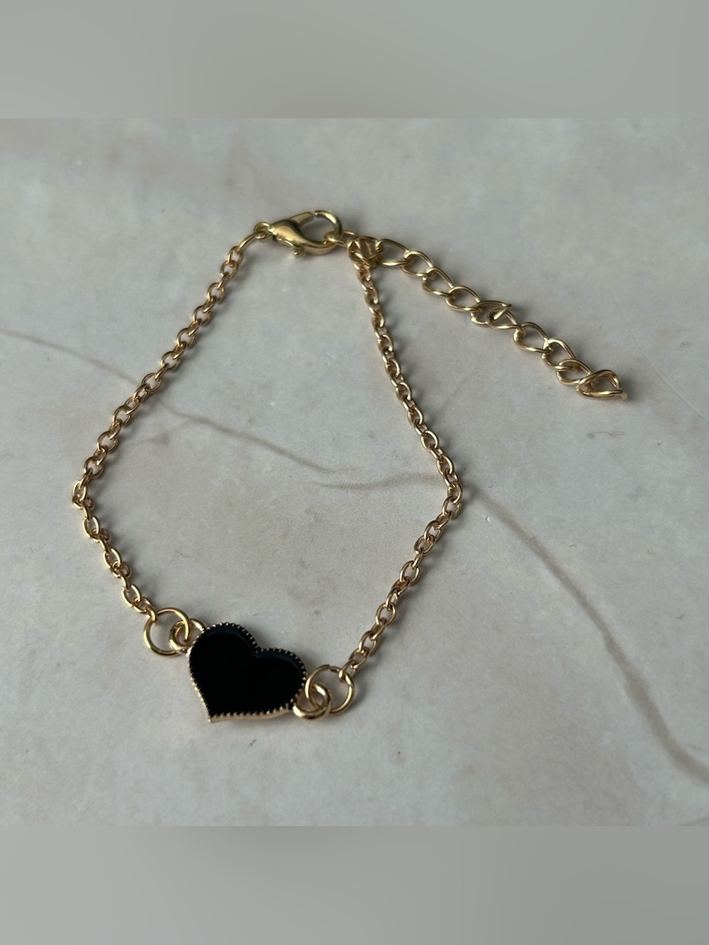 Gold Chain Bracelet with Black Heart Charm